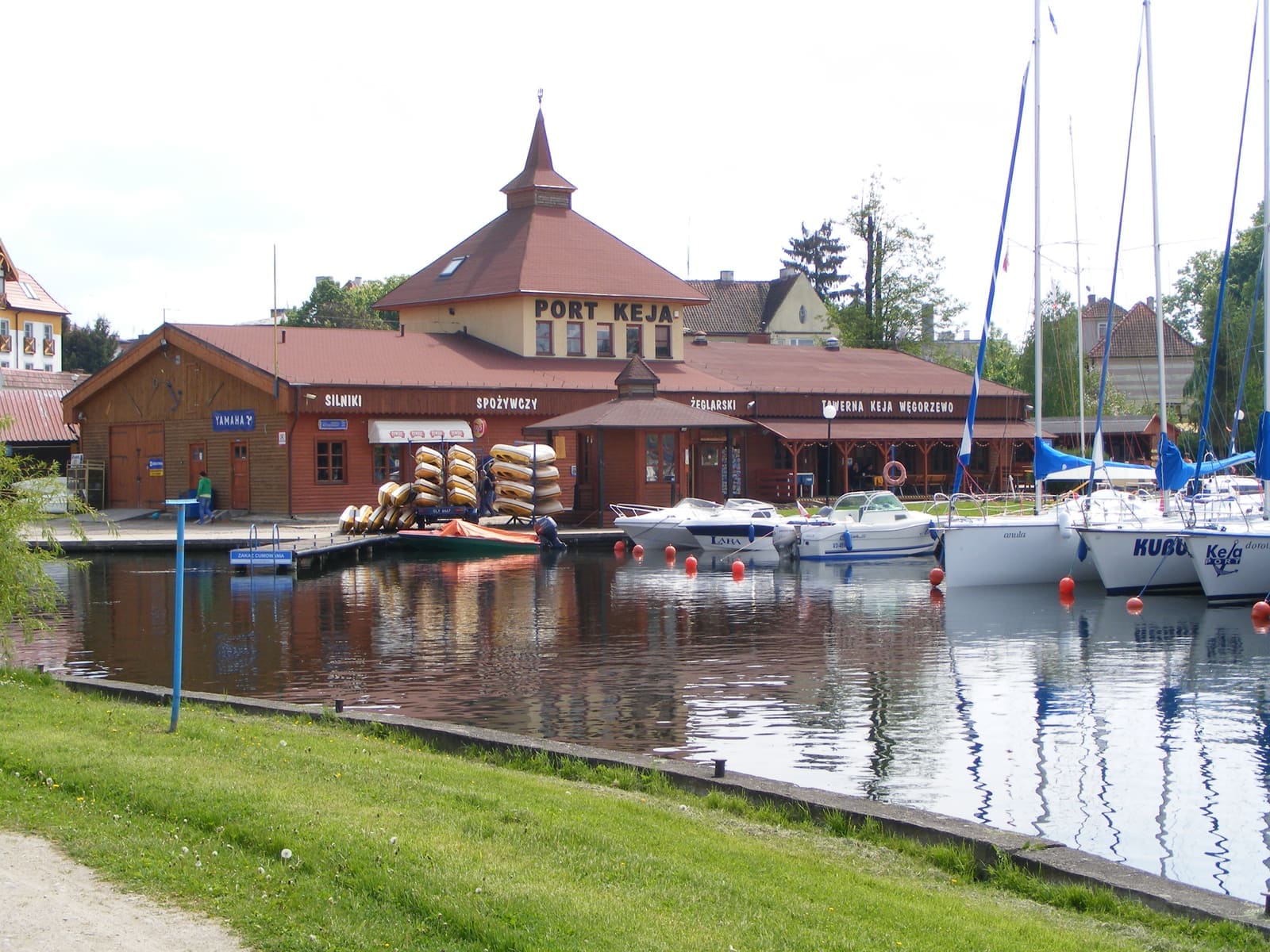Yachts moored at the pontoons in Węgorzewo harbour