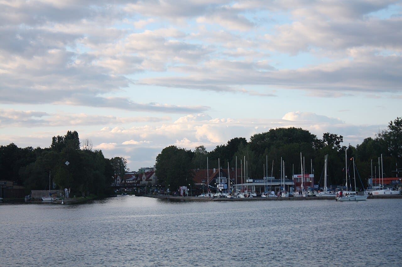 Sailboats on a Masurian lake at sunset